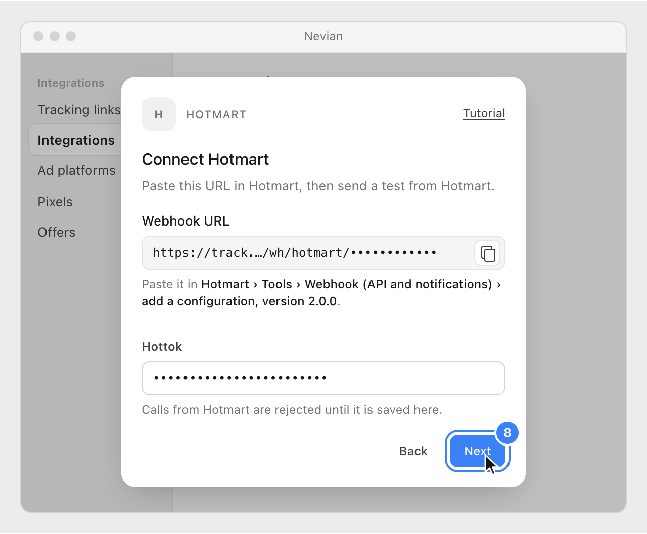 The Connect Hotmart window with the Hottok pasted and the Next button highlighted.